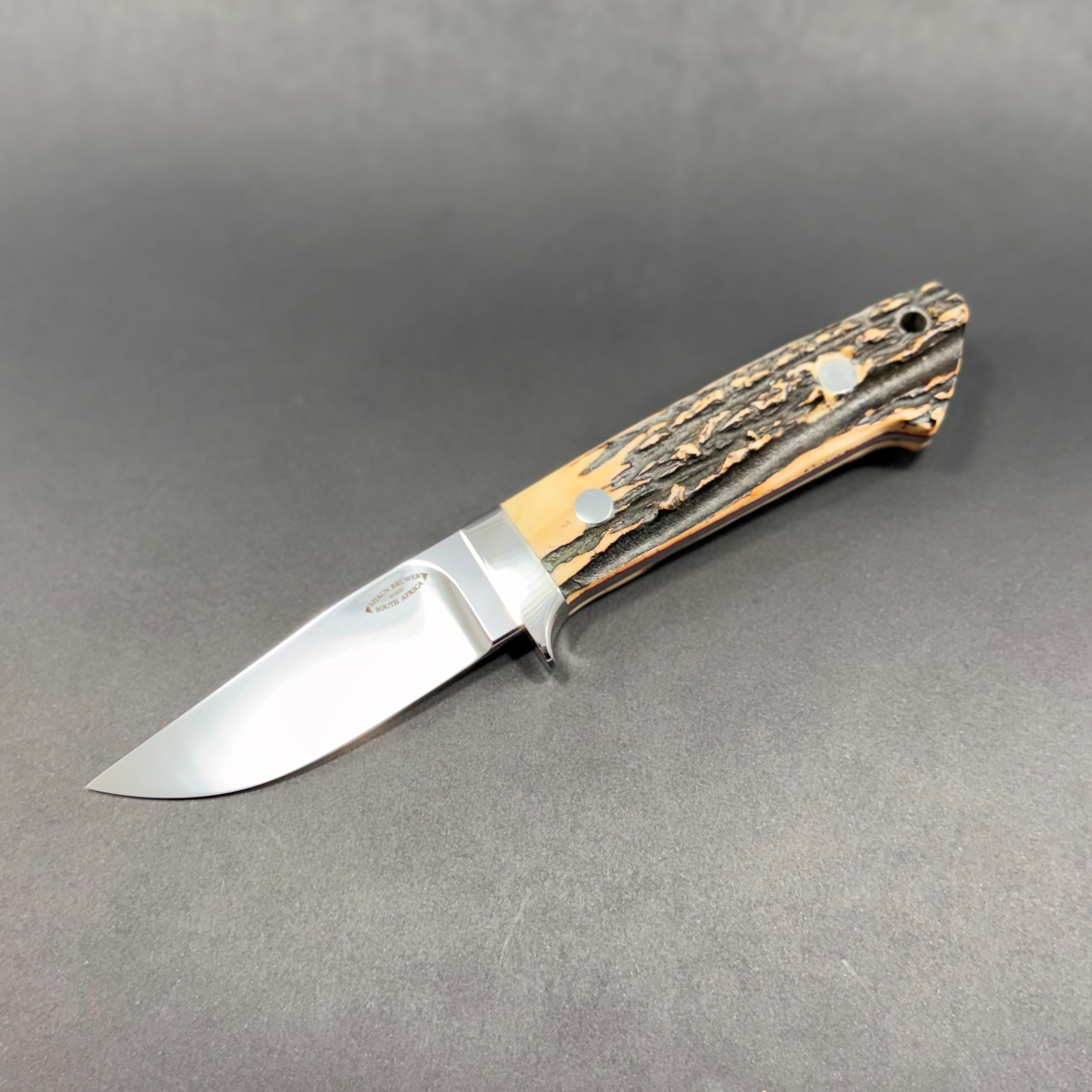 Loveless 4-inch utility hunter in Lohmann 4528 stainless steel with 303 stainless fittings and sambar stag